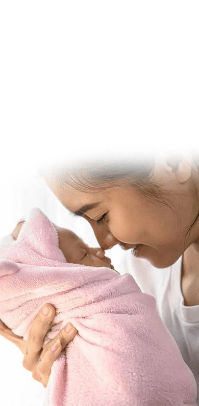 Mother and child nursing at home in Dubai