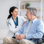 Doctor and senior patient both smiling warmly at each other