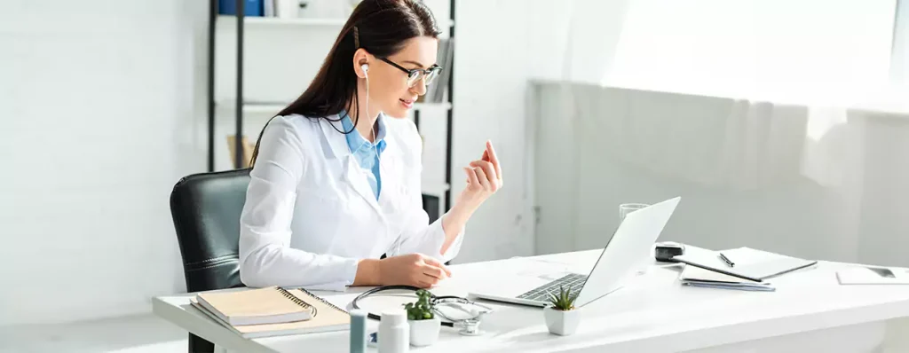 Doctor giving teleconsultation to the patient online