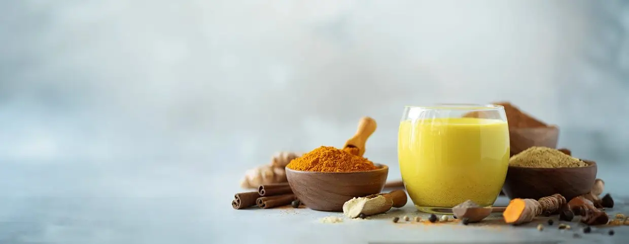 A glass of turmeric milk, a natural remedy for soothing dry cough