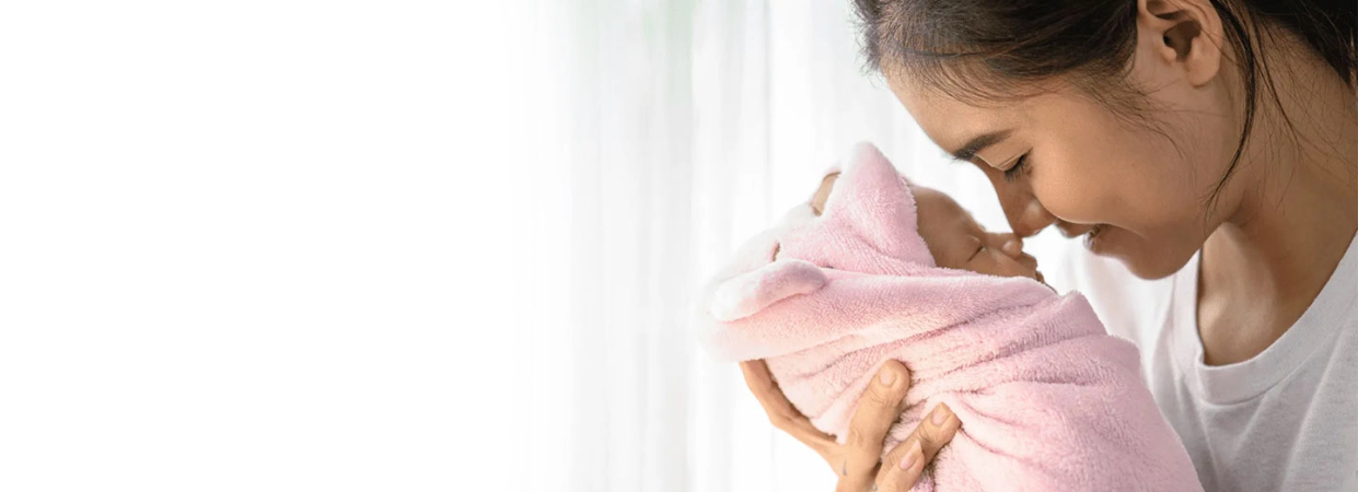 Mother and child nursing at home in Dubai